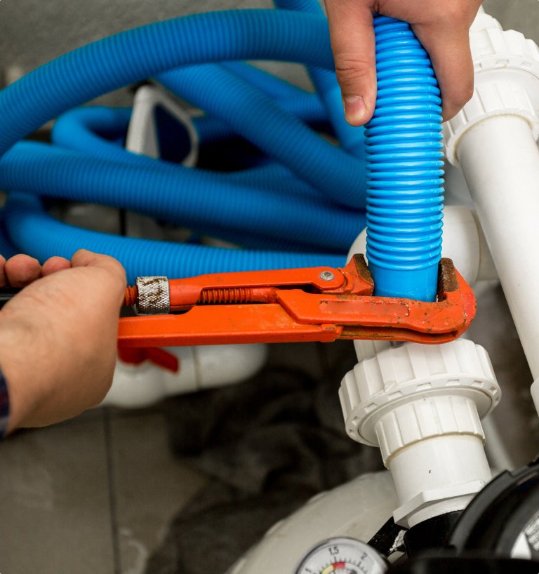 Emergency plumber fixing bathroom pipes and repairing water leak in Toronto property