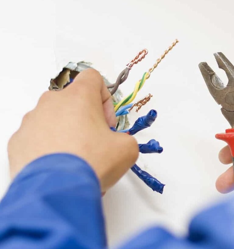 Electrical services repairing electrical outlet and wiring safely in Toronto GTA home