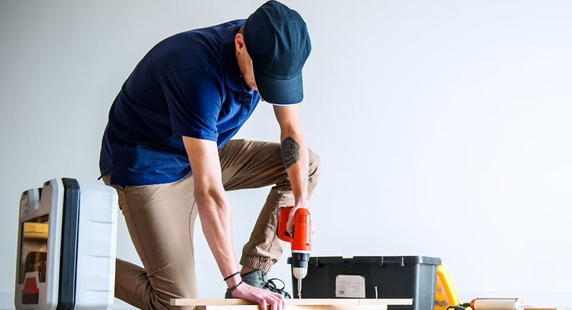 Professional handyman providing general home repair services in Toronto including drywall repair, plumbing fixes, and electrical maintenance